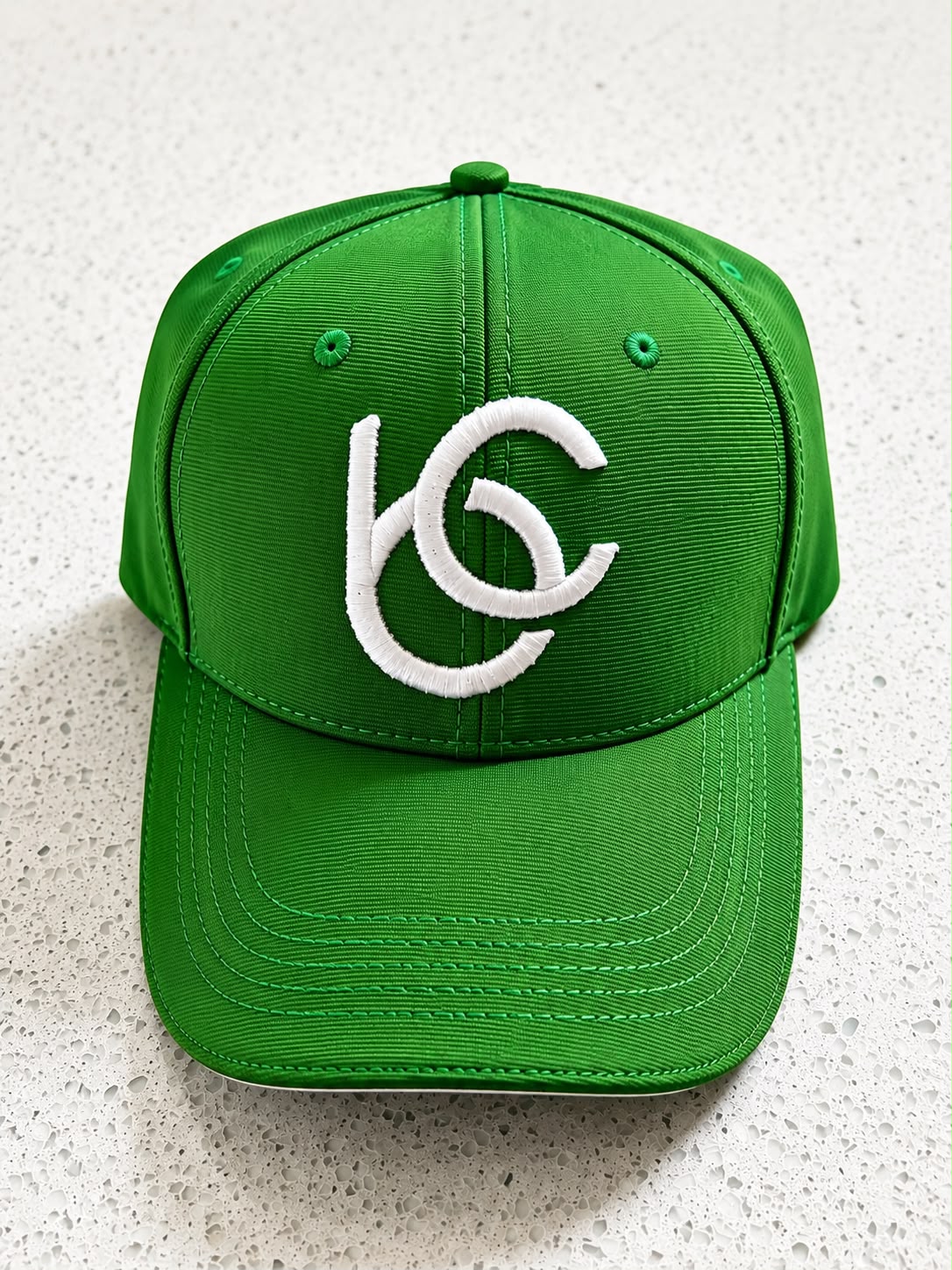 Green face cap